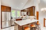 Fully equipped kitchen featuring granite counter tops